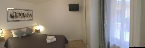 Quartier Saint-Ambroise Apartment | Hotel De L'Horloge