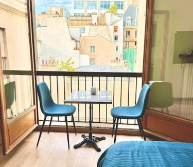 3rd Arrondissement Apartment | Marais Flat with Balcony-Style Windows & Office