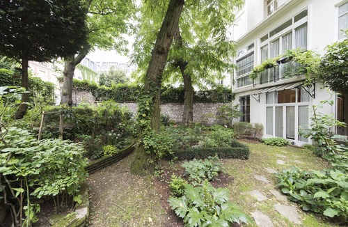 Chaillot Apartment | Antique Charm by Arc de Triomphe, by Veeve