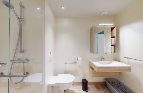 Asnieres-sur-Seine Apartment | Discover Oya near Paris – private units with shared spaces.