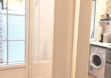 Faubourg Saint-Germain Apartment | Eiffel Tower studio with patio