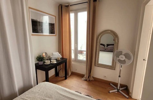 Quartier de la Folie-Mericourt Apartment | Len'appart