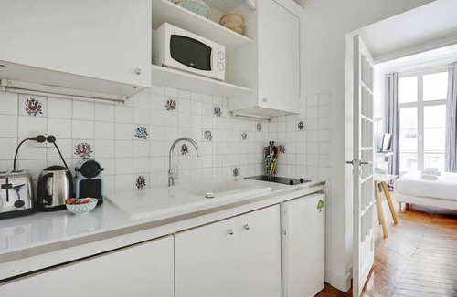 Palais-Royal Apartment | Luminous Studio Oasis Steps from The Louvre
