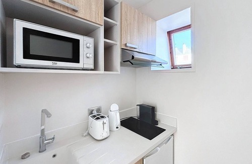 Merville-Franceville-Plage Apartment | Sunny Apartment for 5 in Central Merville-Franceville, Near Beach, Parking Included