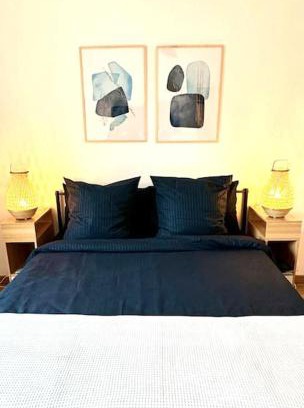 3rd Arrondissement Apartment | Marais Flat with Balcony-Style Windows & Office