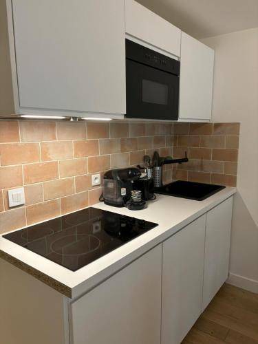 Photo of Kitchen in Quartier de la Folie-Mericourt