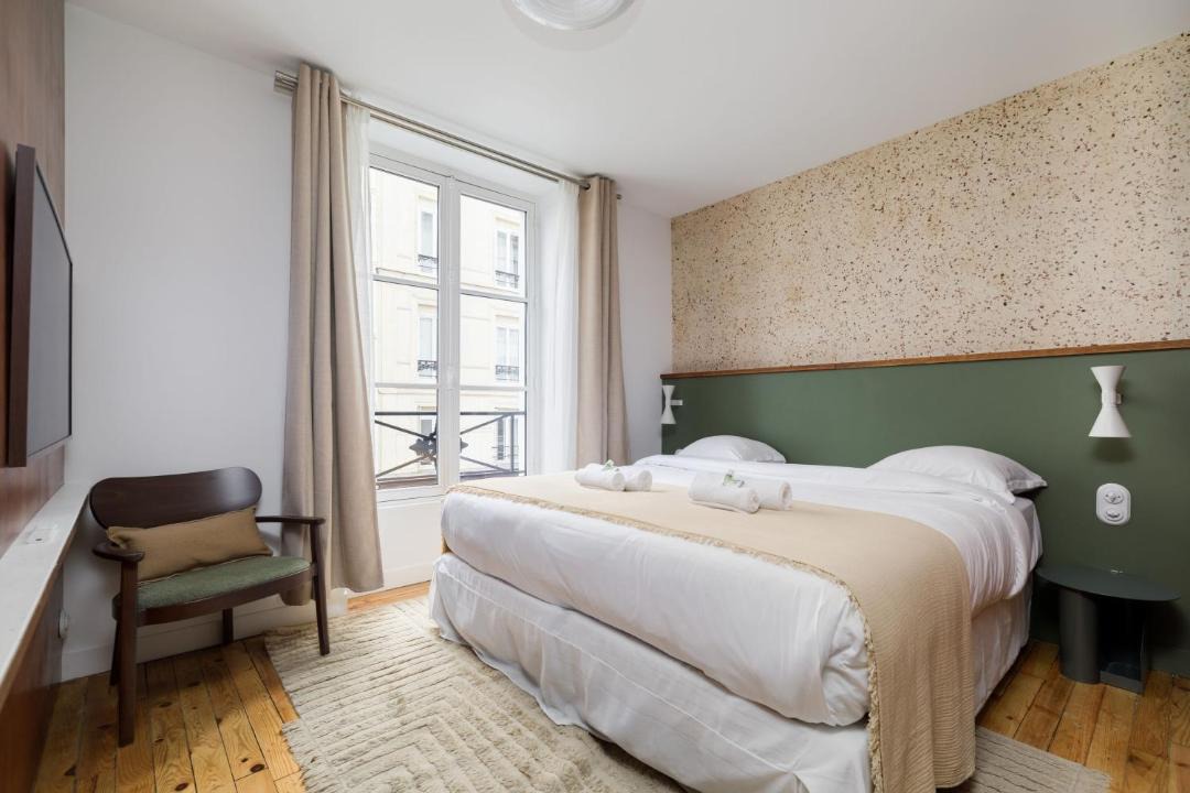 Photo of Bedroom in Quartier de la Folie-Mericourt