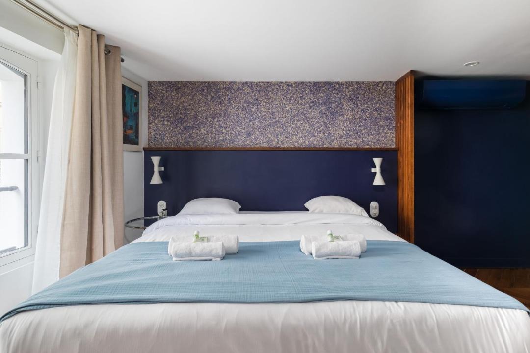Photo of Bedroom in Quartier de la Folie-Mericourt