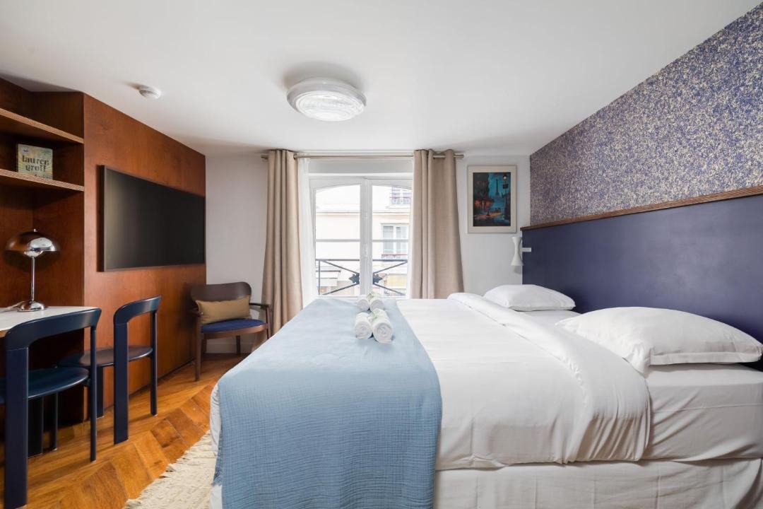 Photo of Bedroom in Quartier de la Folie-Mericourt